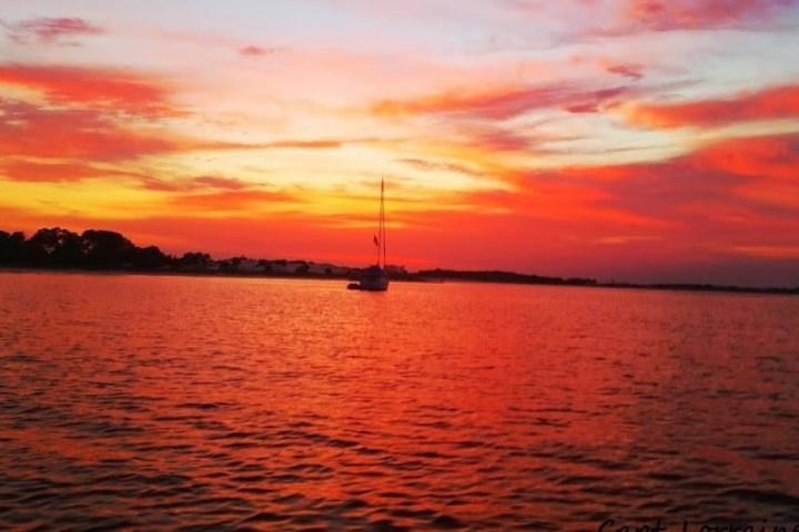 a sunset over a body of water